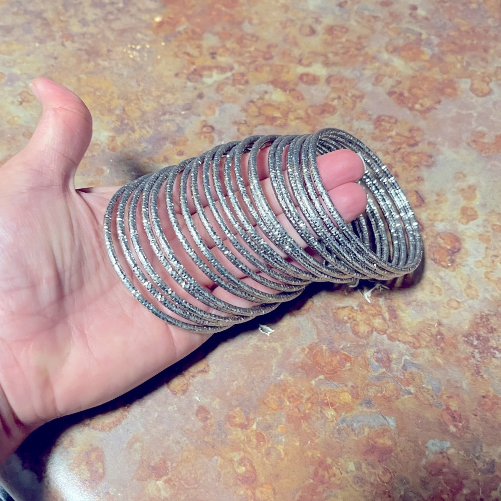 20 pcs silver tone bangles approx 2.75" diam